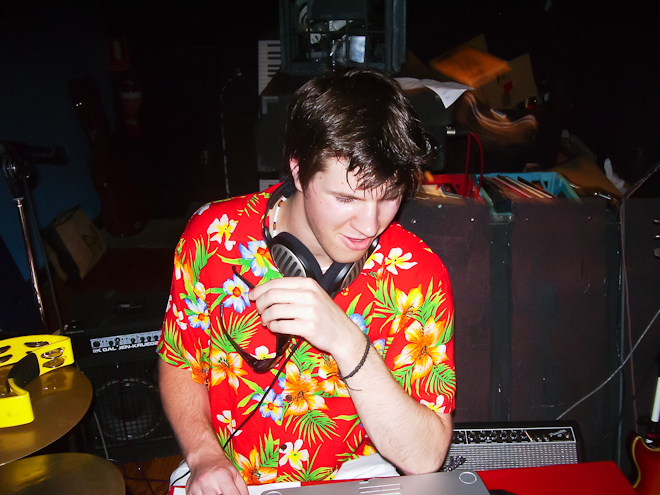 Here is a photo of me DJing at the now defunct Fad Bar one Summer night in 2006, the oldest photo of my headphones I can find. I'm about to drop a mashup of Britney Spear's Toxic with Mike Jones' Still Tippin'. Completely out of sync. How many things have changed since this day? So many things. But the headphones and the fashion have stayed the same.